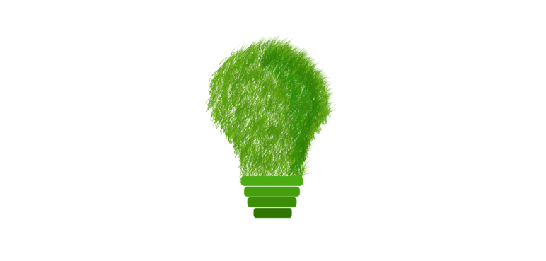 A green cartoon lightbulb made from shapes and grass