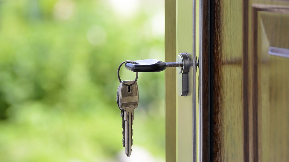 Key hanging in a house door