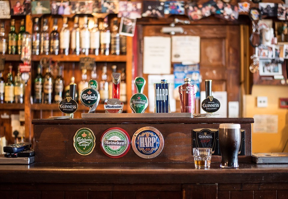 A row of tap handles in a pub