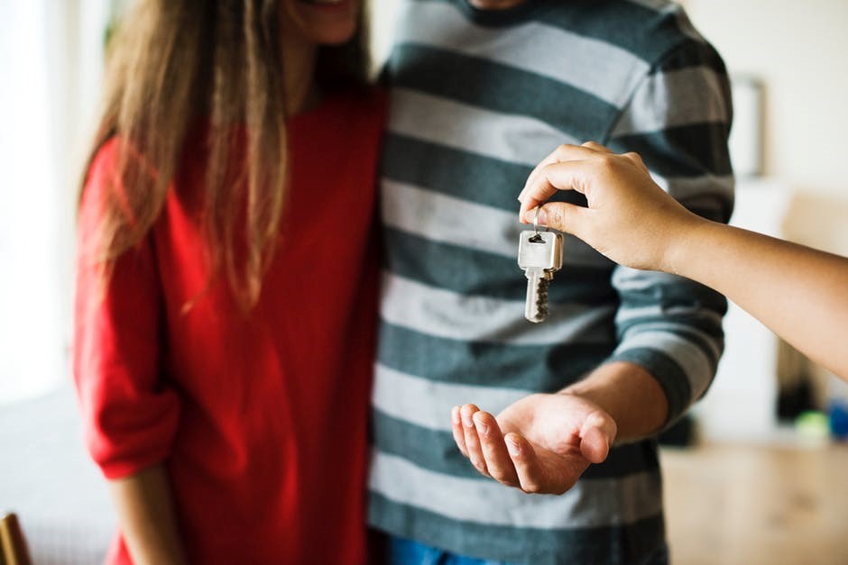 A couple being given keys