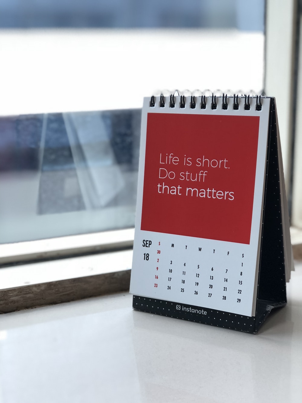 A small calendar with a motivational message