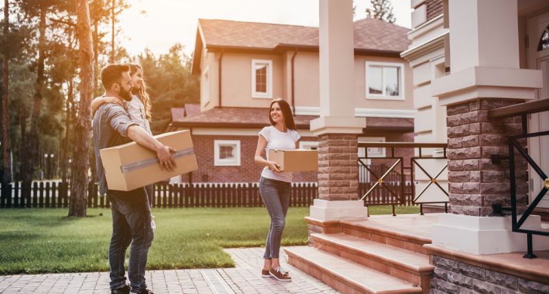 family moving into new home after choosing between a mortgage vs bridging loan